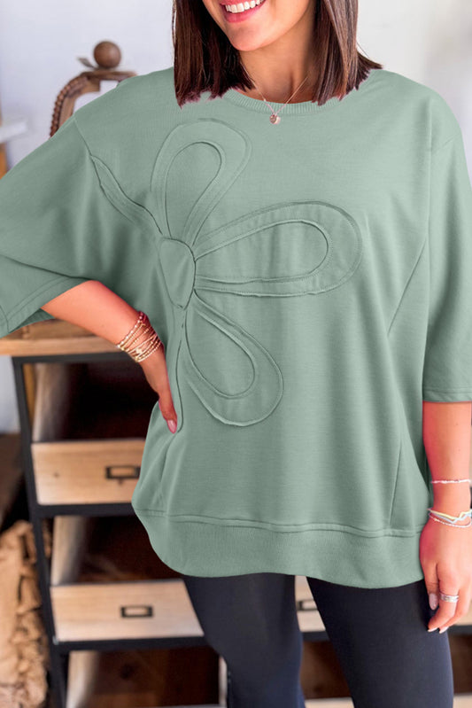 Clearly Aqua Solid Color Floral Patched Half Sleeve Tunic Top